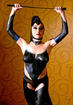 Dominatrix in liquid latex body paint