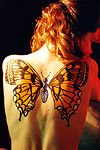 Monarch butterfly painting on models back