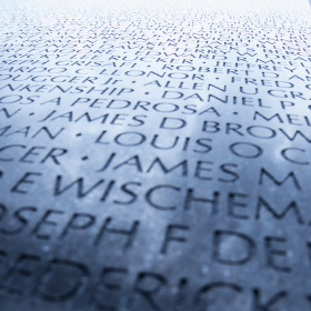 Names on the black wall of the Vietnam Memorial in Washington D.C.