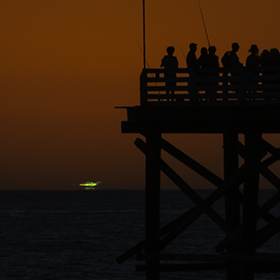 Photograph of the green flash as the sun is setting in San Diego