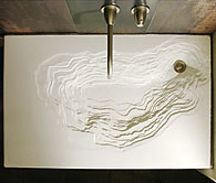 Concrete sink with erosion